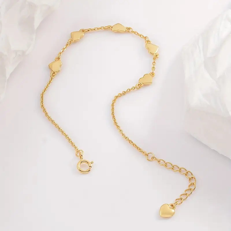 Gouden hartjes armband – 6 fijne hartjes