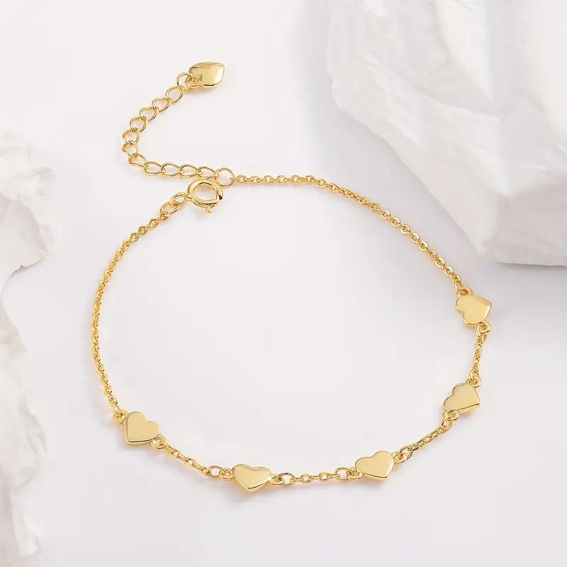 Gouden hartjes armband – 6 fijne hartjes