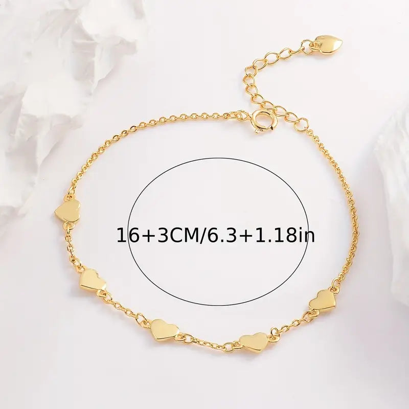 Gouden hartjes armband – 6 fijne hartjes