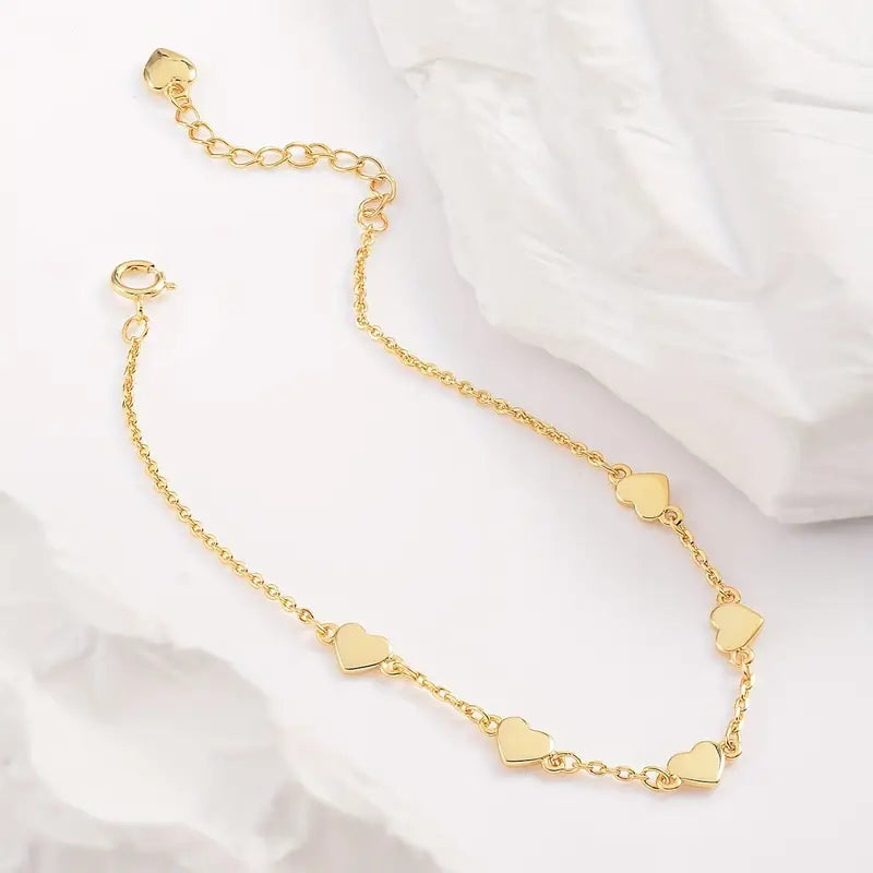 Gouden hartjes armband – 6 fijne hartjes