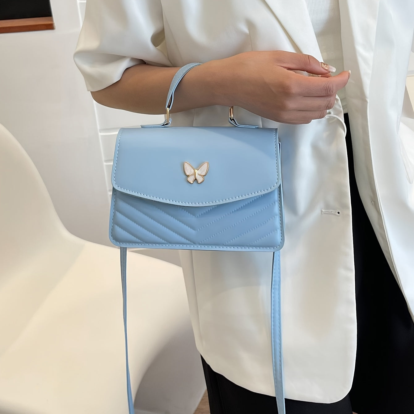 Crossbody tas dames – stijlvol met vlinder detail