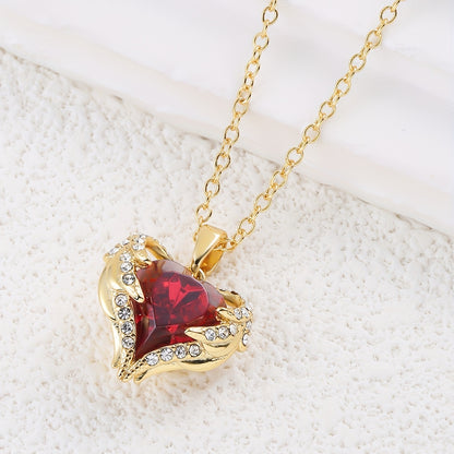 Gouden hartjes ketting met rode zirkonia – 18K Verguld