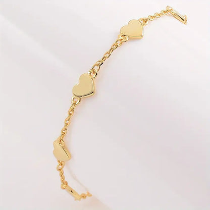 Gouden hartjes armband – 6 fijne hartjes