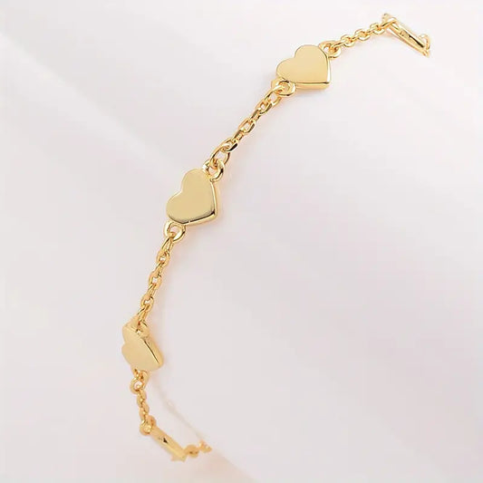 Gouden hartjes armband – 6 fijne hartjes