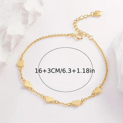 Gouden hartjes armband – 6 fijne hartjes