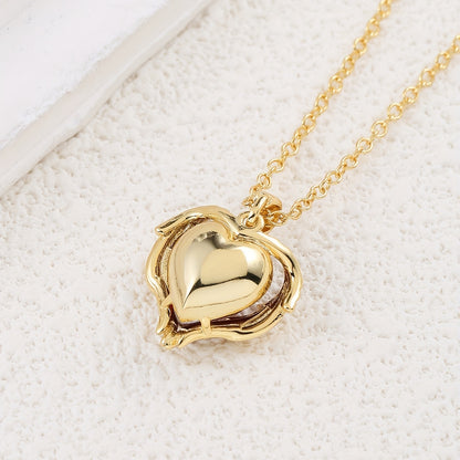 Gouden hartjes ketting met rode zirkonia – 18K Verguld