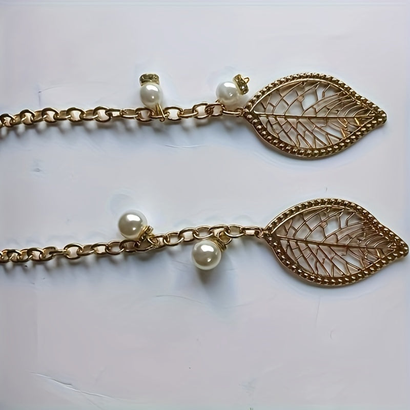 Handtas dames – elegant met gouden details en bedel