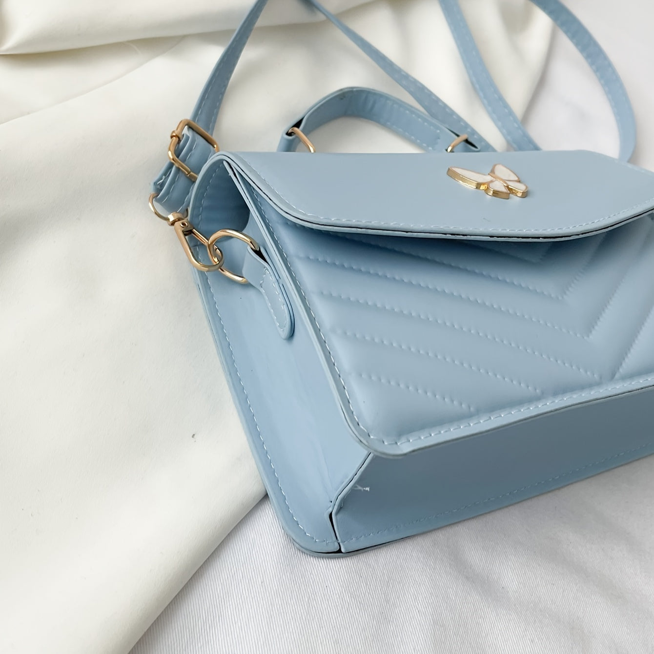 Crossbody tas dames – stijlvol met vlinder detail