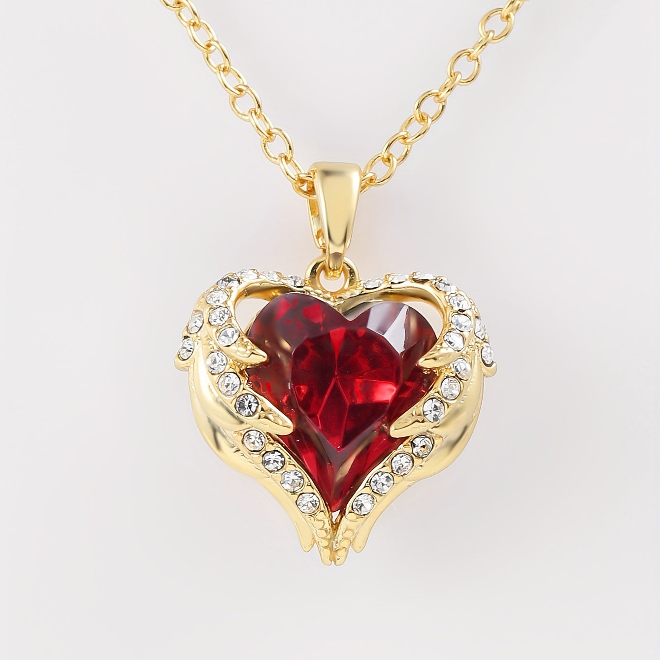 Gouden hartjes ketting met rode zirkonia – 18K Verguld